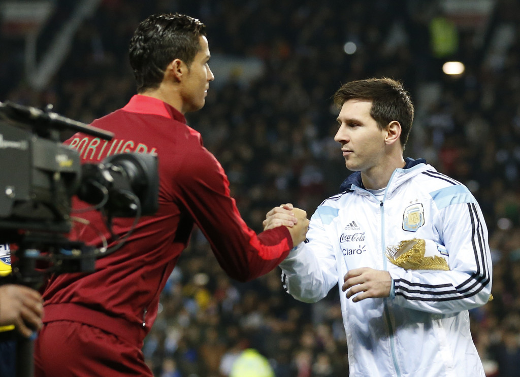 Kristijano Ronaldo i Lionel Mesi, Portugal - Argentina, foto: Guliver/AP Photo/Jon Super Kristijano Ronaldo i Lionel Mesi, Portugal - Argentina