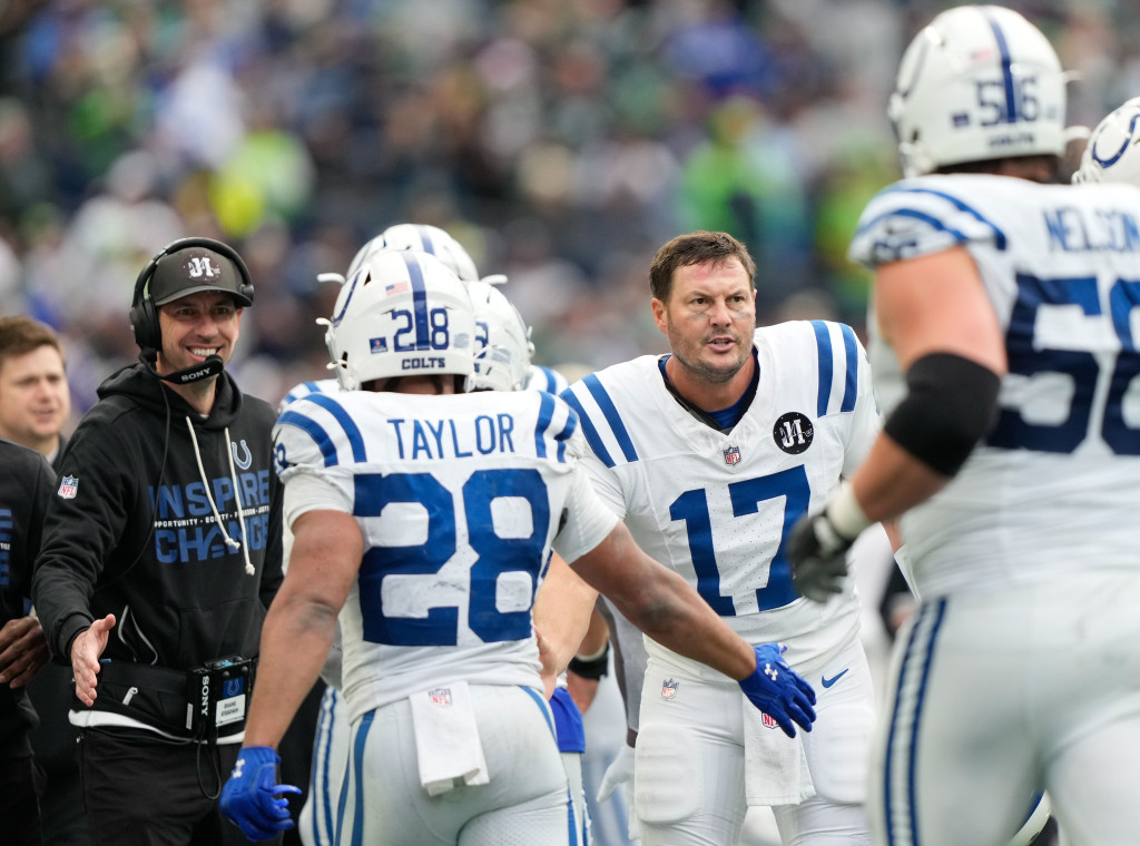 Trener Stajhen i Rivers sa saigračima (Guliver/AP Photo/Stephen Brashear) rivers; colts; seahawks; nfl